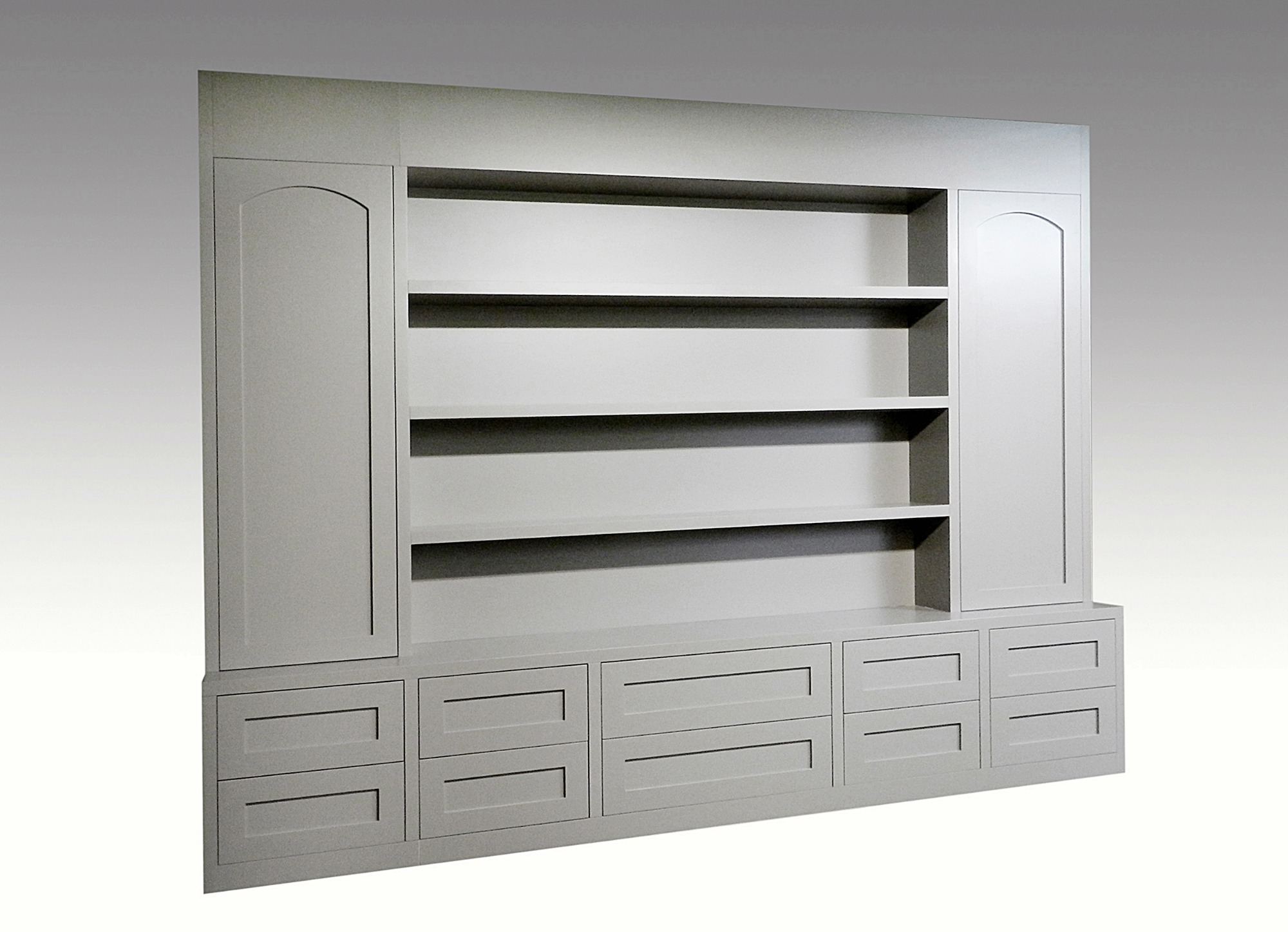 Szara zabudowa ścienna z półkami i szafkami z szufladami, wbudowana w ścianę, bez widocznych elementów montażowych.