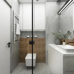 Nowoczesna łazienka z elementami drewna: umywalka nablatowa, toaleta podwieszana, szklana kabina prysznicowa, grzejnik drabinkowy z ręcznikiem i dekoracyjne świece.