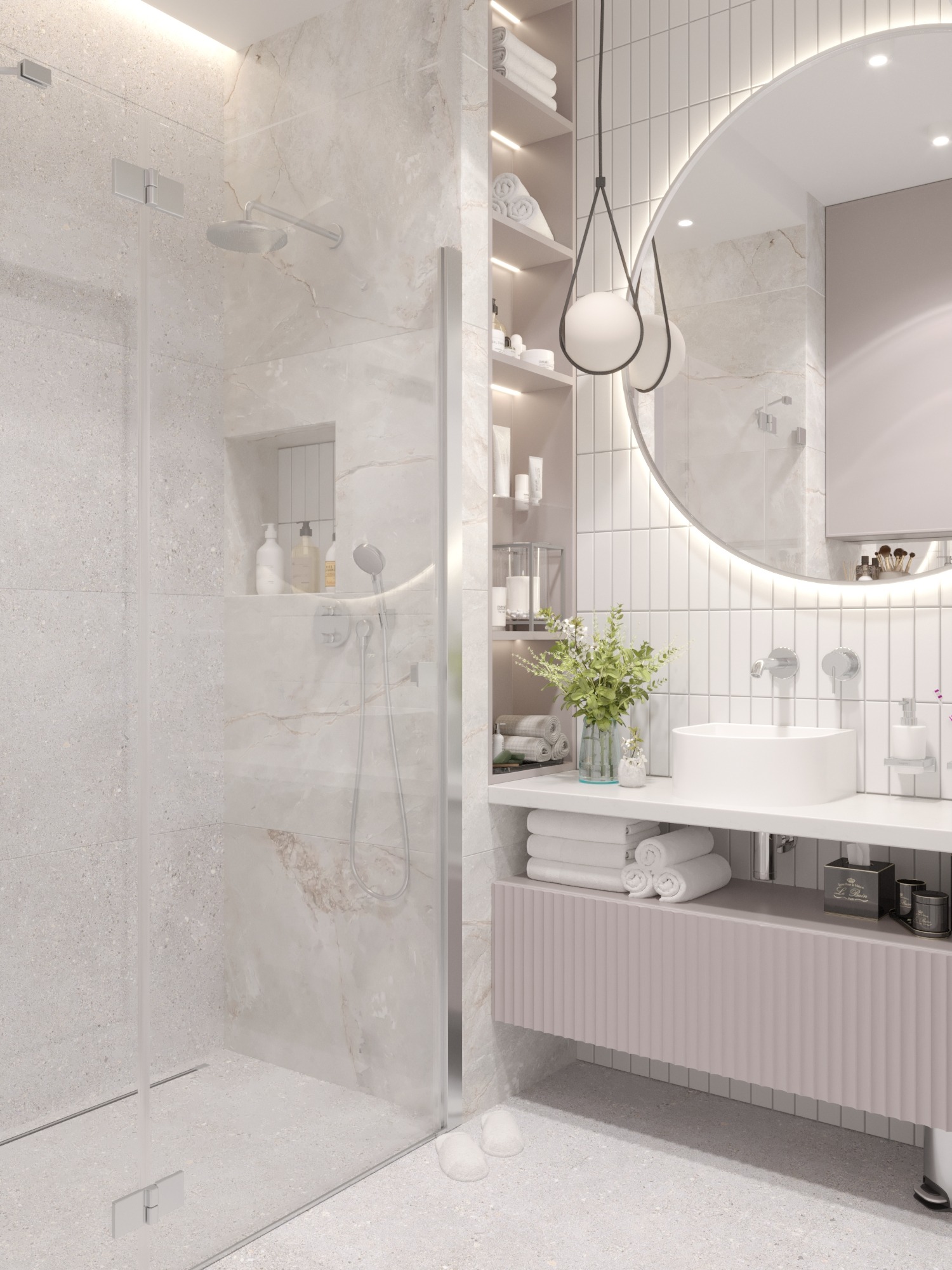 Nowoczesna łazienka w jasnych barwach z kabiną prysznicową, okrągłym lustrem z podświetleniem LED i szafką z umywalką nablatową w pastelowym różu.