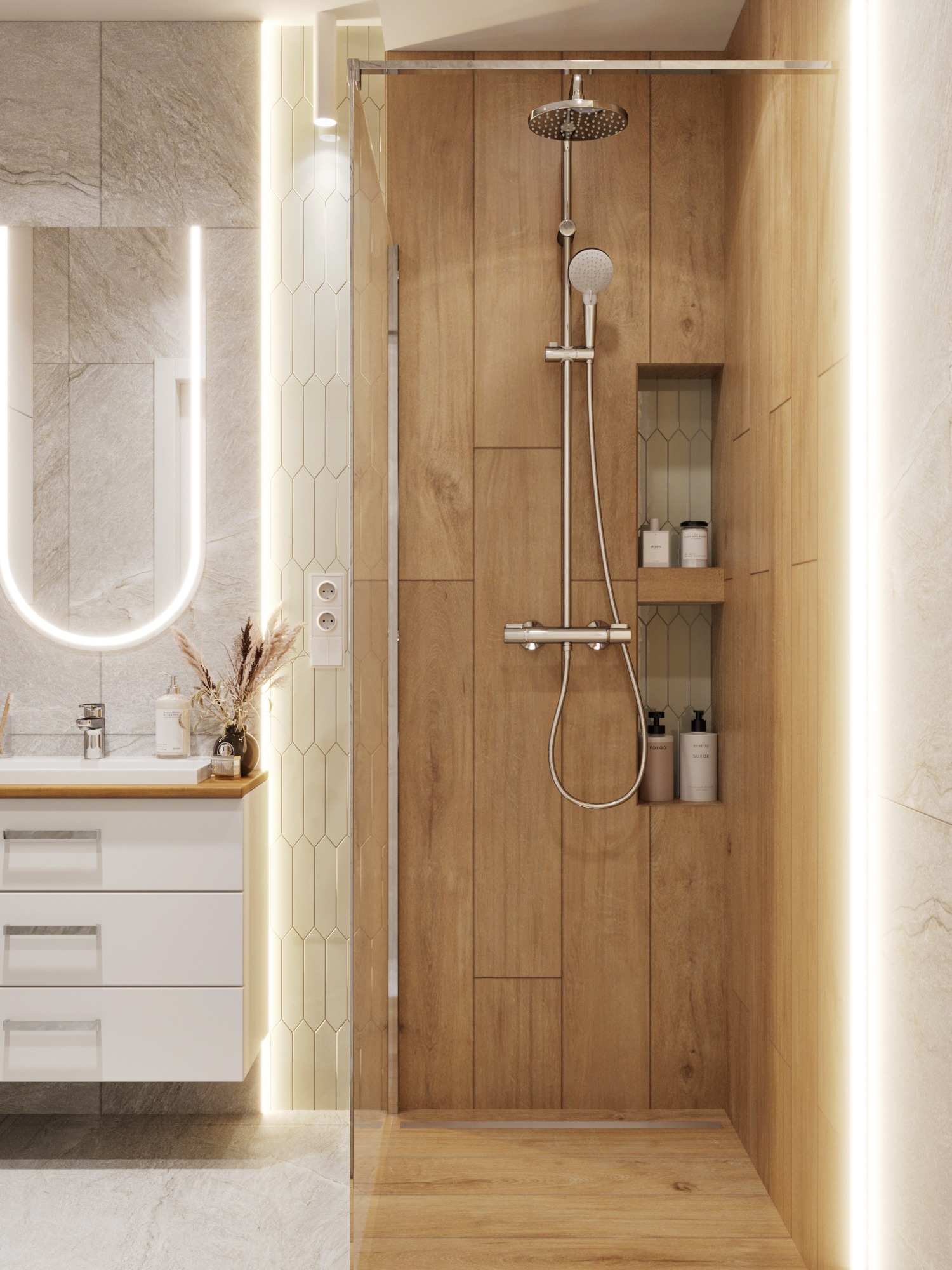 Nowoczesna łazienka z drewnianą kabiną prysznicową, podświetlanym lustrem i umywalką z białymi szafkami. Uwagę zwracają detale: wnęki z kosmetykami i dekoracyjne trawy.