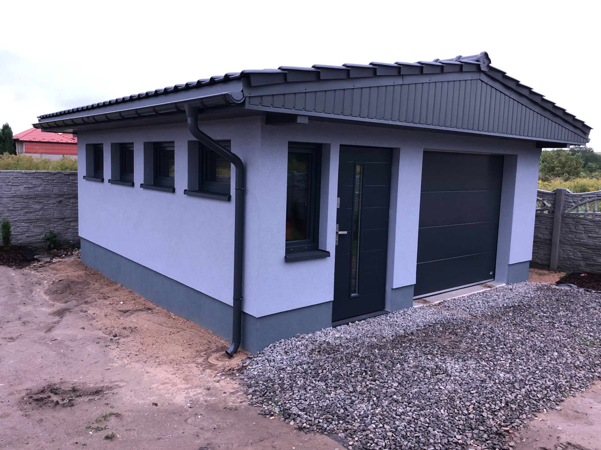 Projekty i budowa garaży