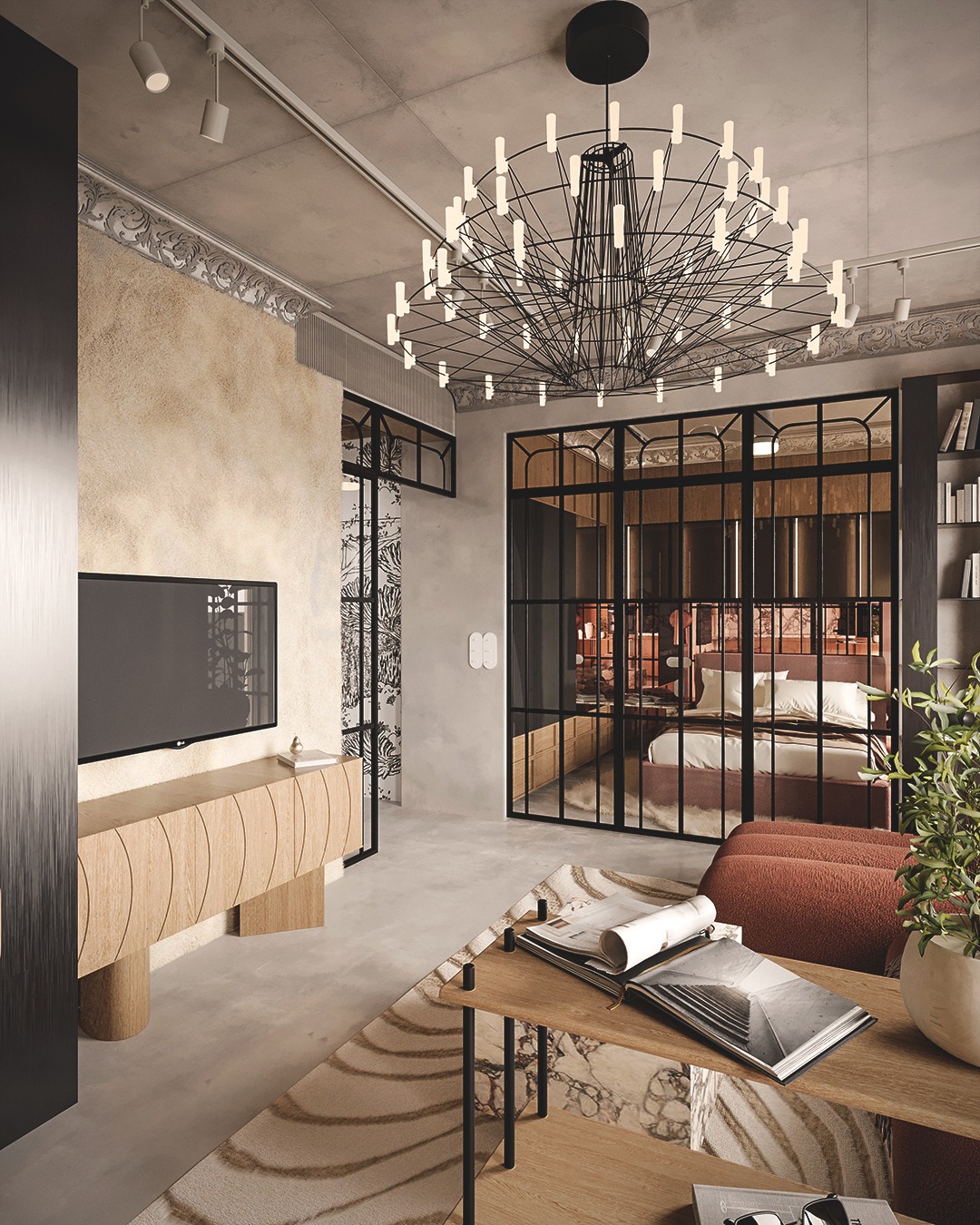 Nowoczesny salon z designerskim oświetleniem sufitowym, telewizorem na drewnianej szafce RTV, szklaną ścianą oddzielającą sypialnię i dywanem w geometryczne wzory.