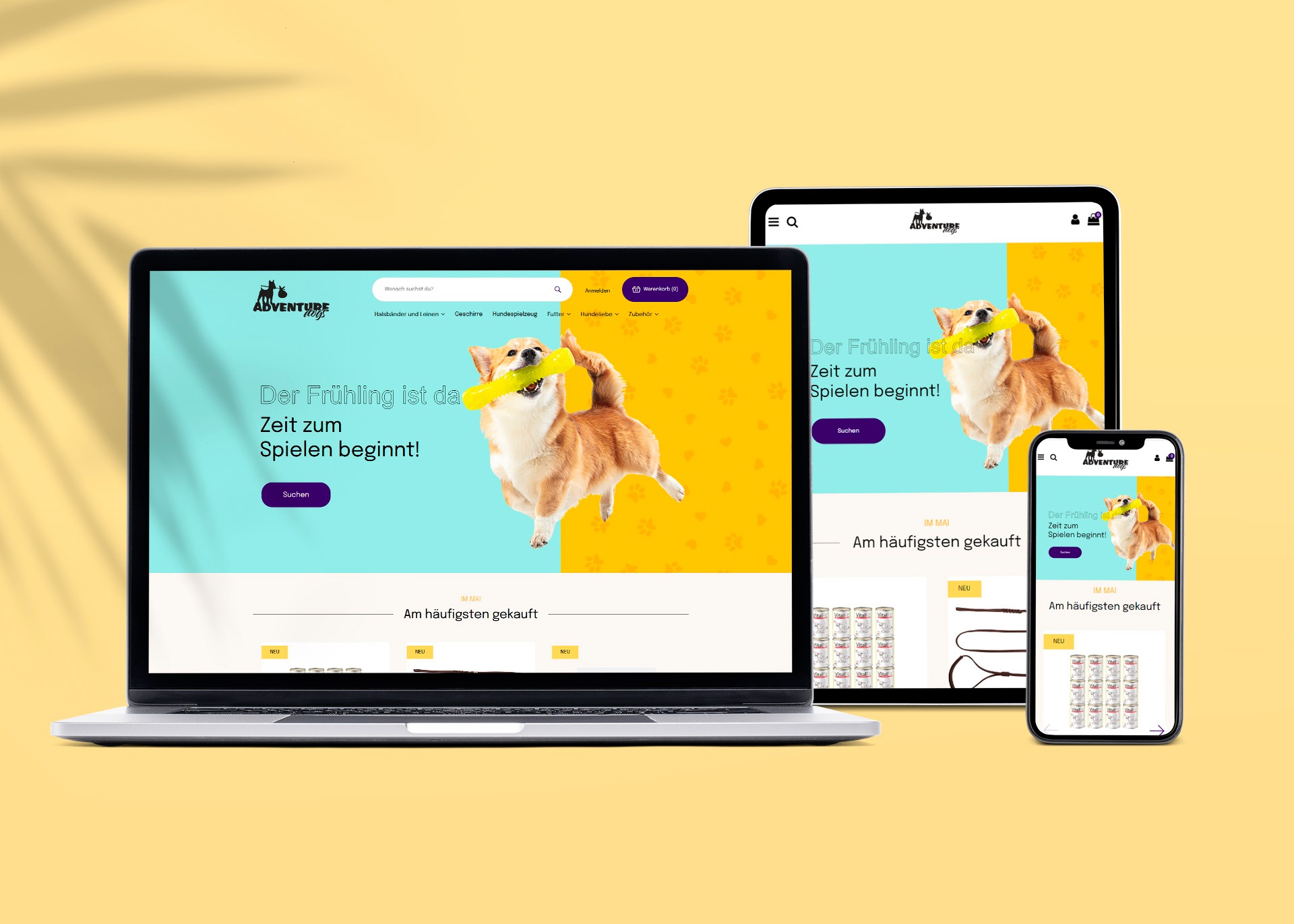 Responsywna strona WWW sklepu zoologicznego na laptopie i smartfonie. W tle cień liści. Projekt strony z psem rasy Corgi. Elementy UI w języku niemieckim.