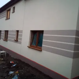 Wykonanie docieplenia + elewacja