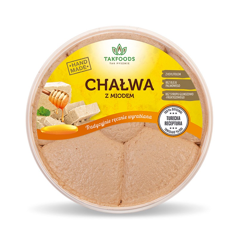 Okrągłe opakowanie chałwy z miodem marki Takfoods, z informacją o ręcznym wyrobie i braku oleju palmowego oraz syropu glukozowo-fruktozowego, z kawałkami chałwy, miodem i miętą na etykiecie.