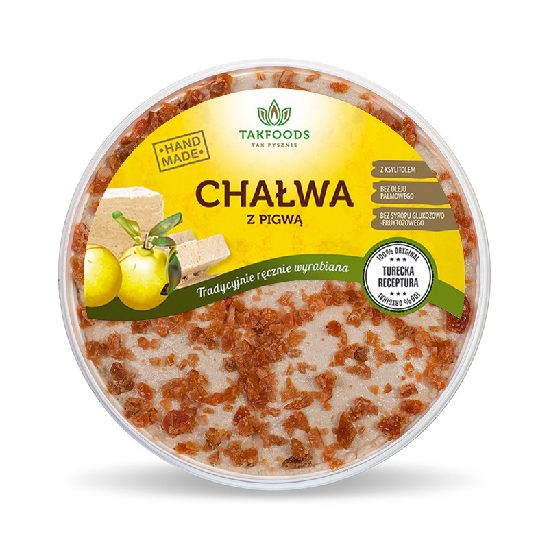 Okrągłe opakowanie chałwy z pigwą marki Takfoods, z widocznymi kawałkami pigwy na wierzchu, informacją o ręcznym wyrobie i braku oleju palmowego oraz syropu glukozowo-fruktozowego.
