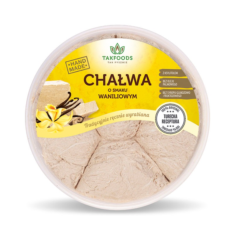 Okrągłe opakowanie z chałwą waniliową, etykieta z napisem 'Hand Made', 'Z ksylitolem', 'Bez oleju palmowego', 'Bez syropu glukozowo-fruktozowego', '100% Oryginalna Turecka Receptura'.