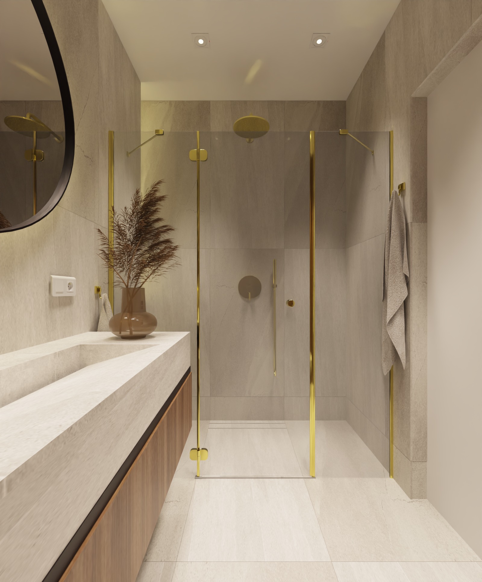 Elegancka łazienka z kabiną prysznicową w odcieniach beżu i złota. Umywalka z blatem imitującym marmur, okrągłe lustro i dekoracyjna trawa pampasowa w wazonie.