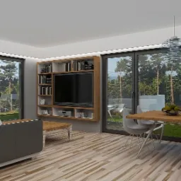 Wnętrze salonu z drewnianą podłogą, szarą sofą, regałem z telewizorem, stołem z owocami i widokiem na las przez duże okna.