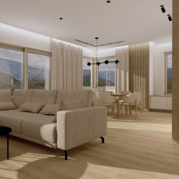Ami Interior Projektowanie Wnętrz Renata Olejniczak - Jasny salon z beżową sofą, stolikiem kawowym, stołem jadalnym i dużymi oknami z widokiem na góry. Nowoczesny design z drewnianymi akcentami i minimalistycznym oświetleniem.