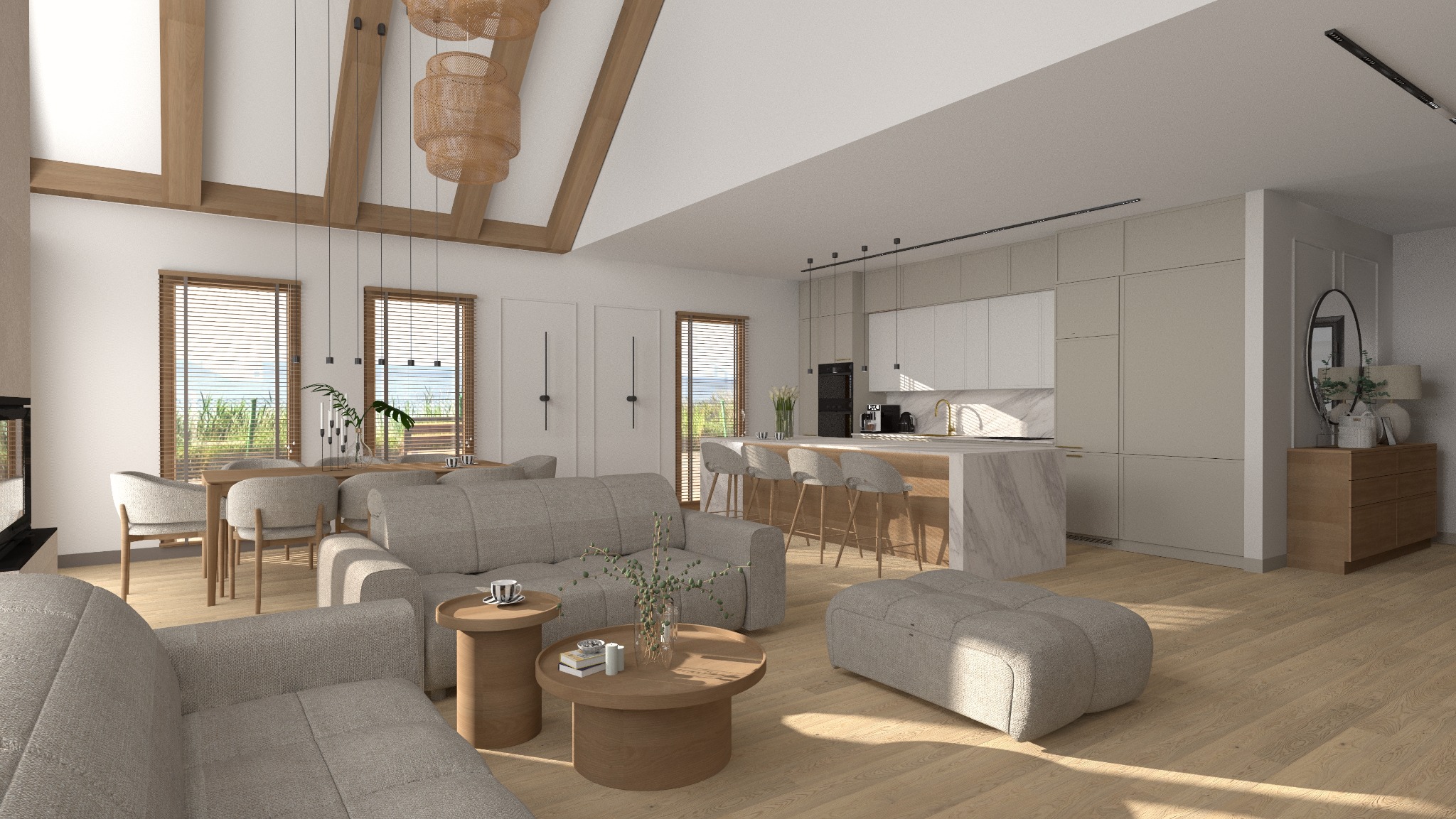 Jasne, przestronne wnętrze z otwartą kuchnią i salonem. Widoczne drewniane belki stropowe, szare sofy, stół jadalny i marmurowy blat kuchenny. Całość w neutralnej kolorystyce z akcentami drewna.