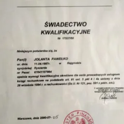 Skan świadectwa kwalifikacyjnego wydanego przez Ministra Finansów dla Jolanty Pawełko, potwierdzającego uprawnienia do usługowego prowadzenia ksiąg rachunkowych, z pieczęcią urzędową i podpisem.