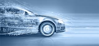 Dynamiczne ujęcie samochodu w ruchu, efekt rozmycia podkreśla prędkość, dominująca paleta barw niebieskich.