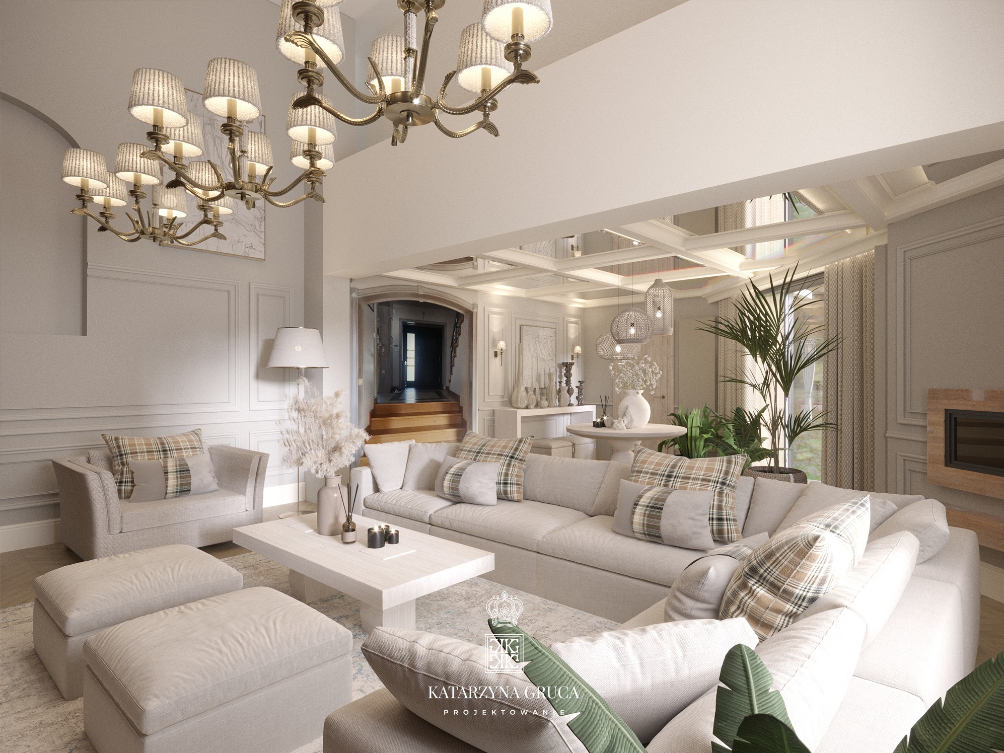 Elegancki salon w jasnych barwach z dużym narożnikiem, dwoma pufami i fotelami. Nad sofą wiszą dwie bogato zdobione lampy. W tle widoczny hol z drewnianymi schodami i dekoracjami.