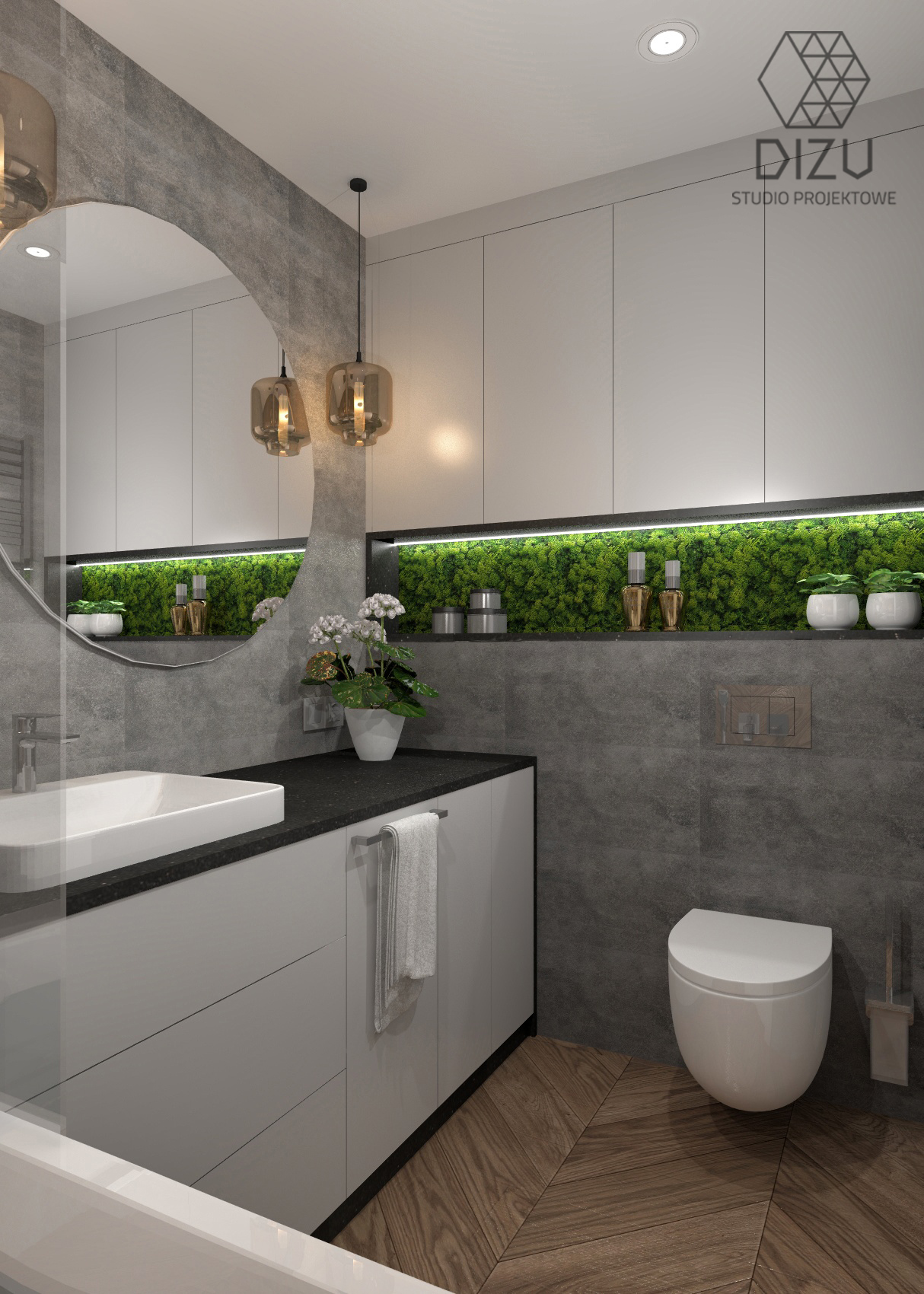 Nowoczesna łazienka z szarą płytką, białymi szafkami pod umywalką, okrągłym lustrem, drewnianą podłogą w jodełkę i zielonym panelem dekoracyjnym nad toaletą.