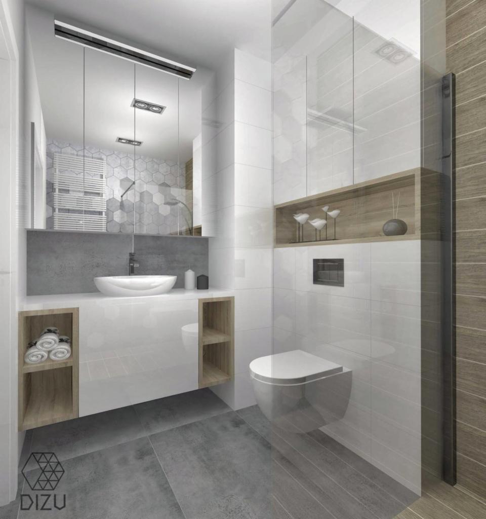 Nowoczesna łazienka z białymi płytkami, szarą podłogą, wiszącą toaletą i umywalką nablatową, akcentowana drewnianymi półkami i dekoracjami.