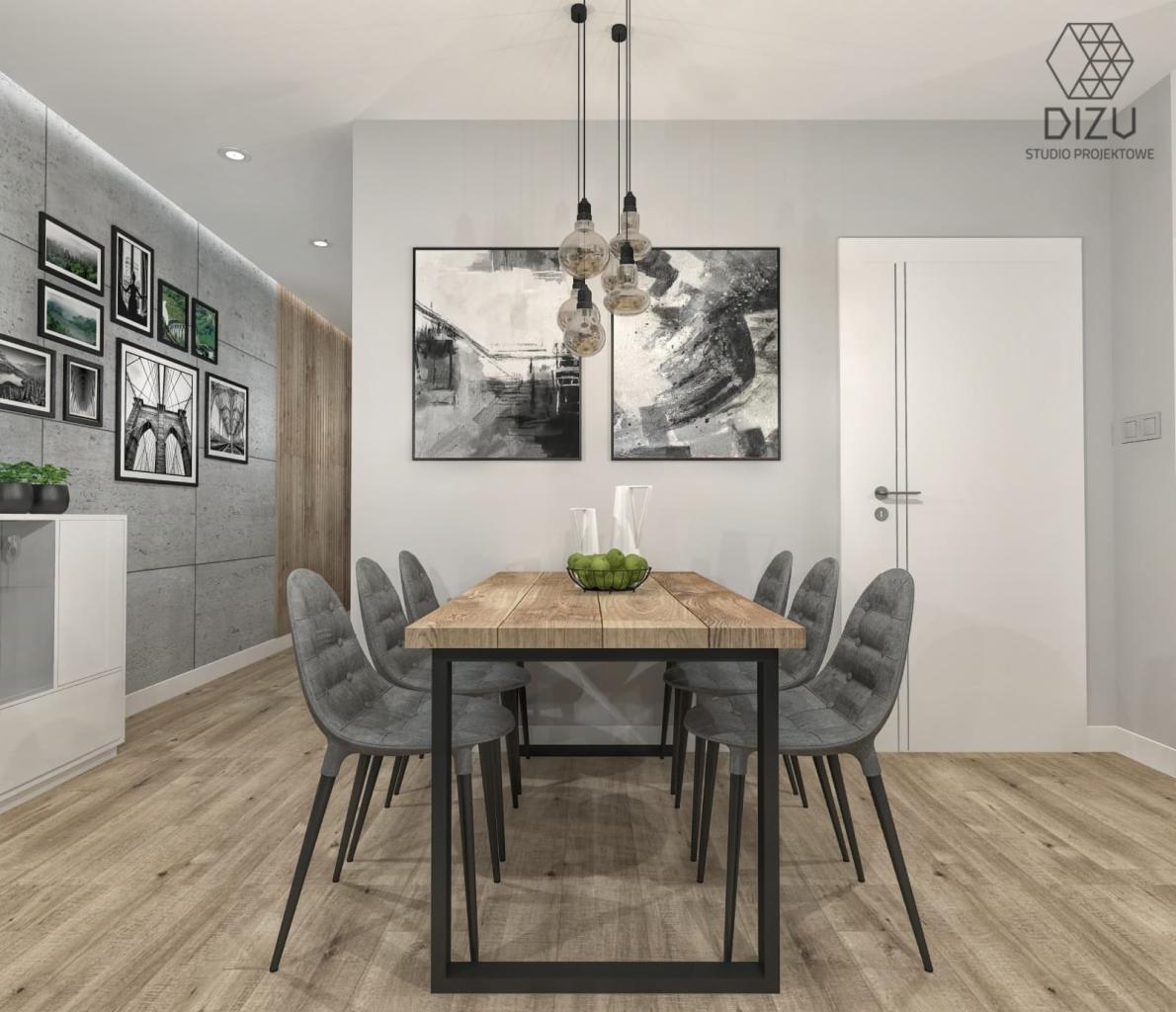 Nowoczesna jadalnia z drewnianym stołem na metalowych nogach, szarymi krzesłami z tapicerowanymi siedziskami, wiszącymi lampami z żarówkami Edisona i abstrakcyjnymi obrazami na ścianie, w tle...