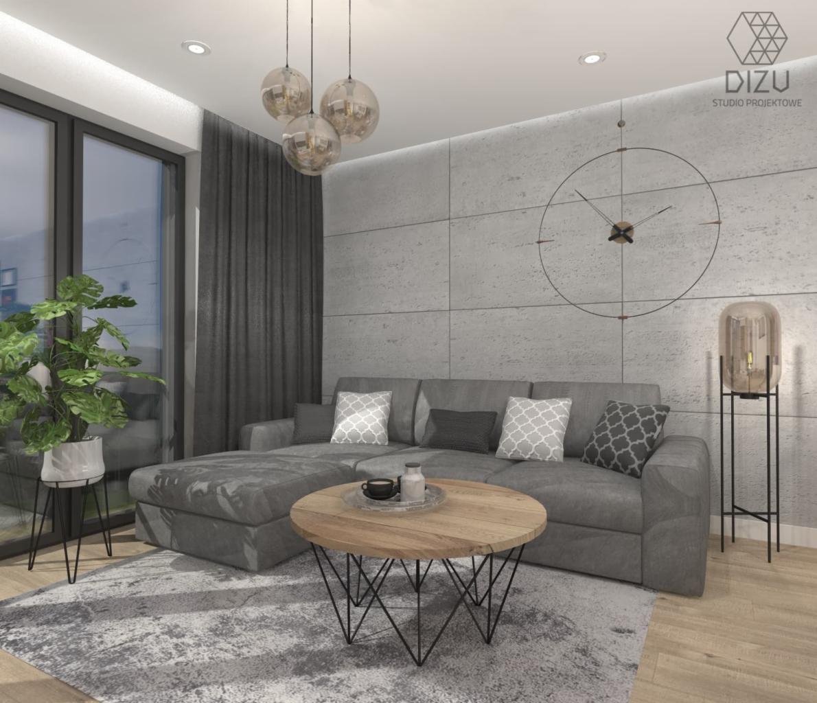 Nowoczesny salon z szarą sofą narożną, okrągłym stolikiem kawowym z drewnianym blatem i metalową podstawą, dekoracyjnym zegarem ściennym oraz lampą podłogową w kształcie walca, oświetlony trzema...