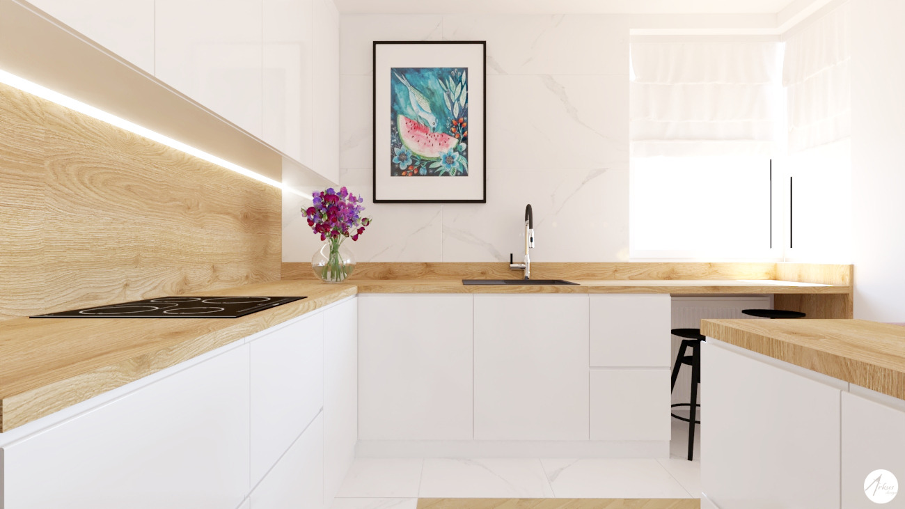 Wizualizacja nowoczesnej kuchni z białymi szafkami i drewnianym blatem, płyta indukcyjna wkomponowana w blat, na ścianie obrazek z motywem arbuza, bukiet kwiatów w szklanym wazonie.