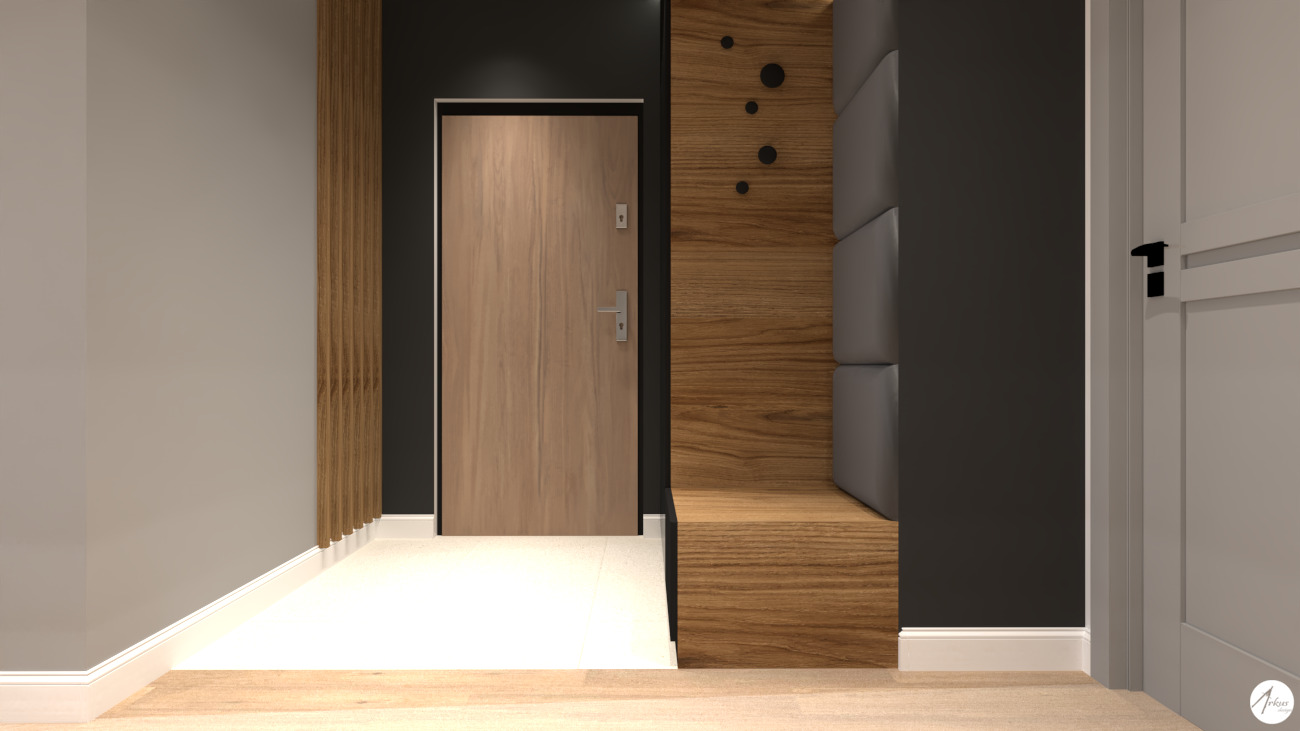 Wnętrze nowoczesnego przedpokoju z drewnianą ścianą, tapicerowanym siedziskiem, i drzwiami wejściowymi w odcieniach beżu.