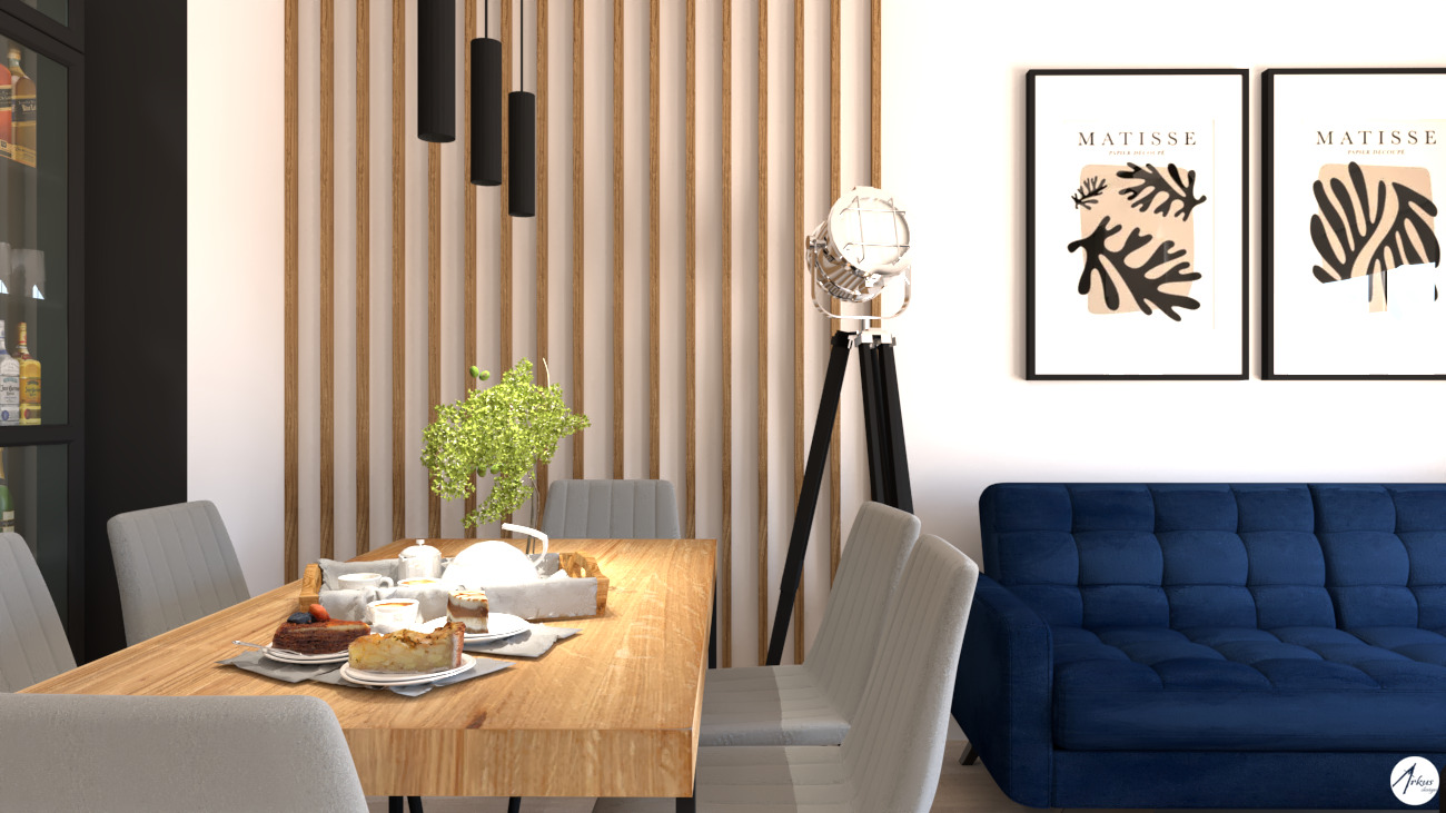 Jasna jadalnia z drewnianym stołem, zastawą, ciastem, szarą tapicerowaną krzesłami, niebieską kanapą i dekoracjami ściennymi w stylu Matisse.