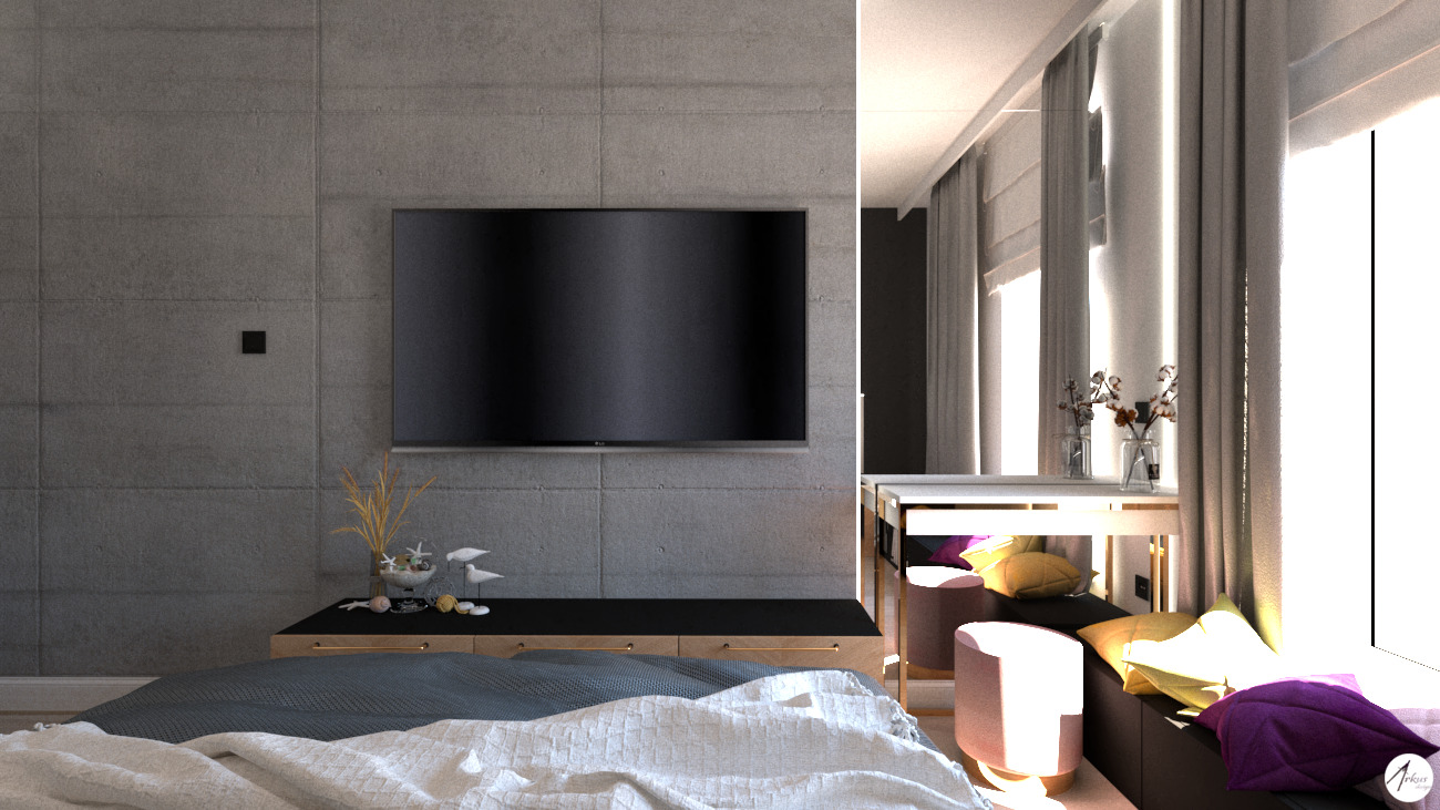 Nowoczesna sypialnia z szarą betonową ścianą, telewizorem, niską komodą z dekoracjami, łóżkiem z szarą i białą pościelą oraz kącikiem do siedzenia przy oknie z pufami i poduszkami w odcieniach...