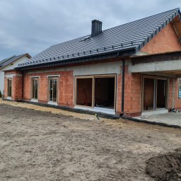 Effect Consulting-Krystian Stach - Inwestycja Suchy Bór marzec 2026. Okna na profilach Kommerling 88MD w kolorze turner oak