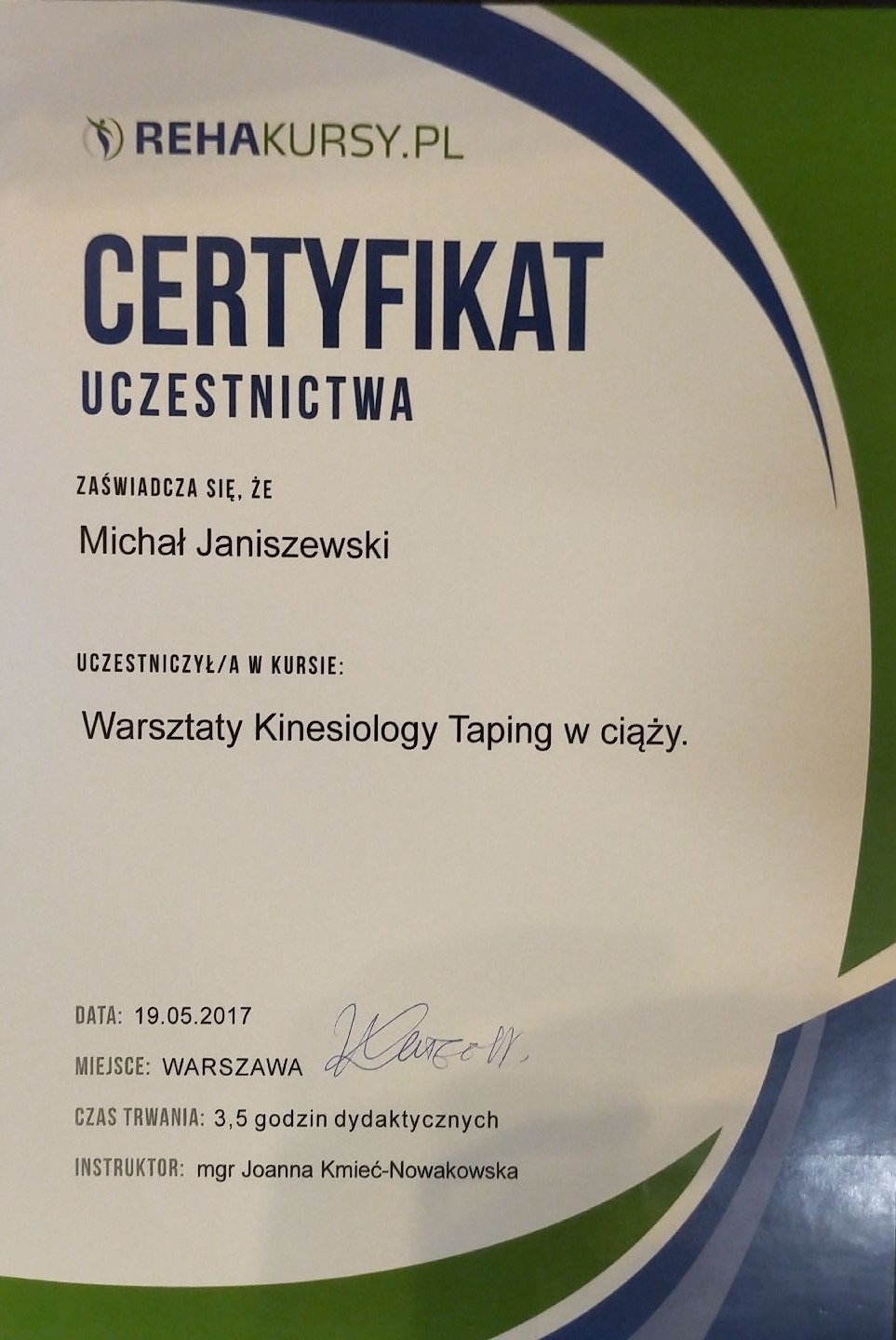 Certyfikat uczestnictwa w warsztatach Kinesiology Taping w ciąży, wystawiony dla Michała Janiszewskiego przez Rehakursy.pl, podpisany przez mgr Joannę Kmieć-Nowakowską.