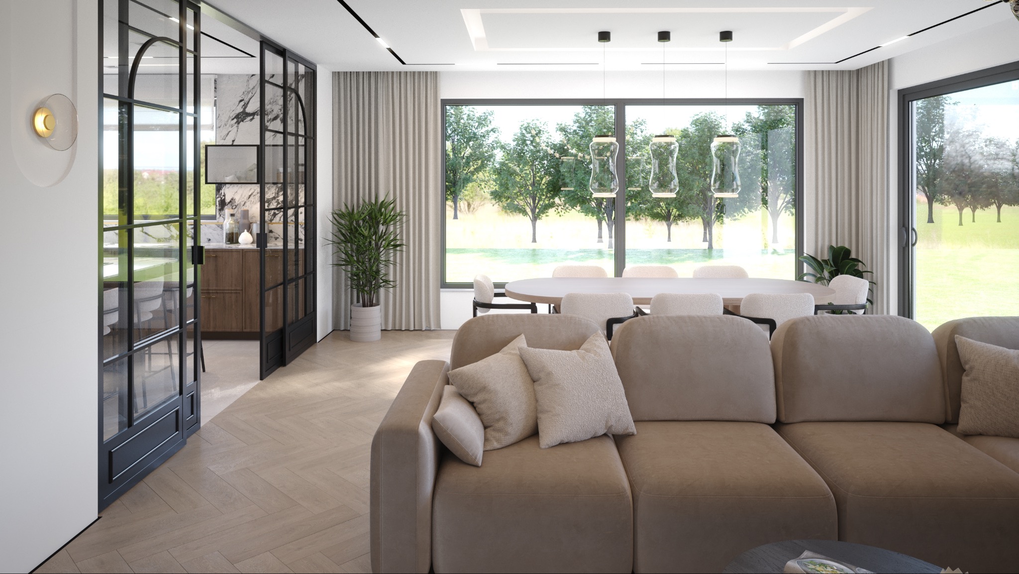 Stylowy salon z beżową sofą, okrągłym stołem i dużymi oknami z widokiem na zieleń. Czarne, przeszklone drzwi oddzielają kuchnię z marmurowym blatem.