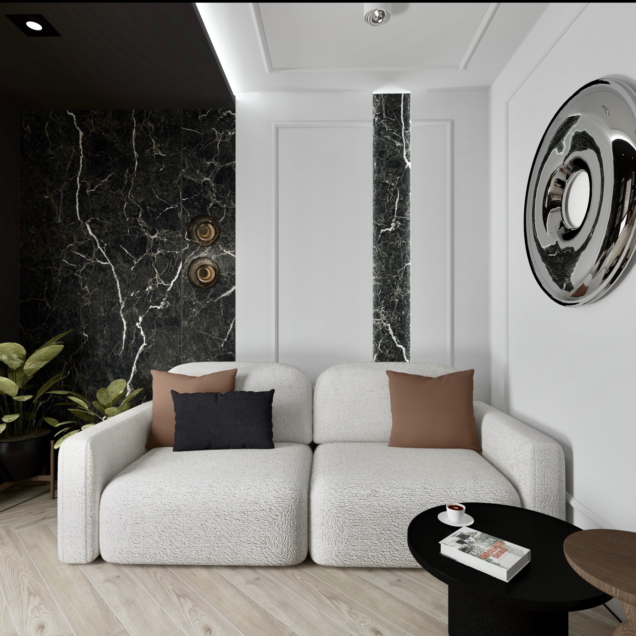 Elegancki salon z białą sofą, marmurową ścianą i okrągłym lustrem. Na stoliku kawa i książka. Nowoczesne oświetlenie i drewniana podłoga dodają wnętrzu charakteru.