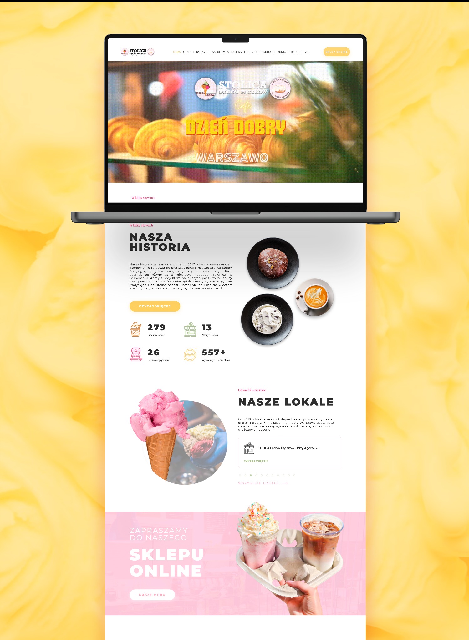 Laptop wyświetlający stronę internetową kawiarni 'Stolica Lodów Pączków' z widocznym menu, historią firmy i ofertą lodów, pączków, kawy oraz lokalizacjami w Warszawie.