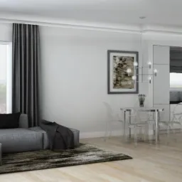 Wizualizacja nowoczesnego salonu z aneksem kuchennym, szary narożnik z czarnymi poduszkami, okno z widokiem na miasto, okrągły stół z przezroczystymi krzesłami, minimalistyczna kuchnia w bieli...