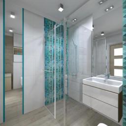 Malaga - Wizualizacja nowoczesnej łazienki z kabiną prysznicową, umywalką nablatową z szafką i płytkami w odcieniach błękitu i turkusu z geometrycznym wzorem trójkątów.