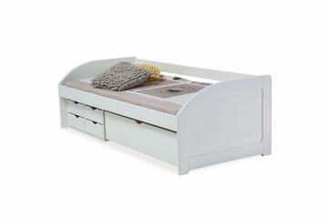 Białe łóżko dziecięce z szufladami i szarą poduszką na jasnym tle.