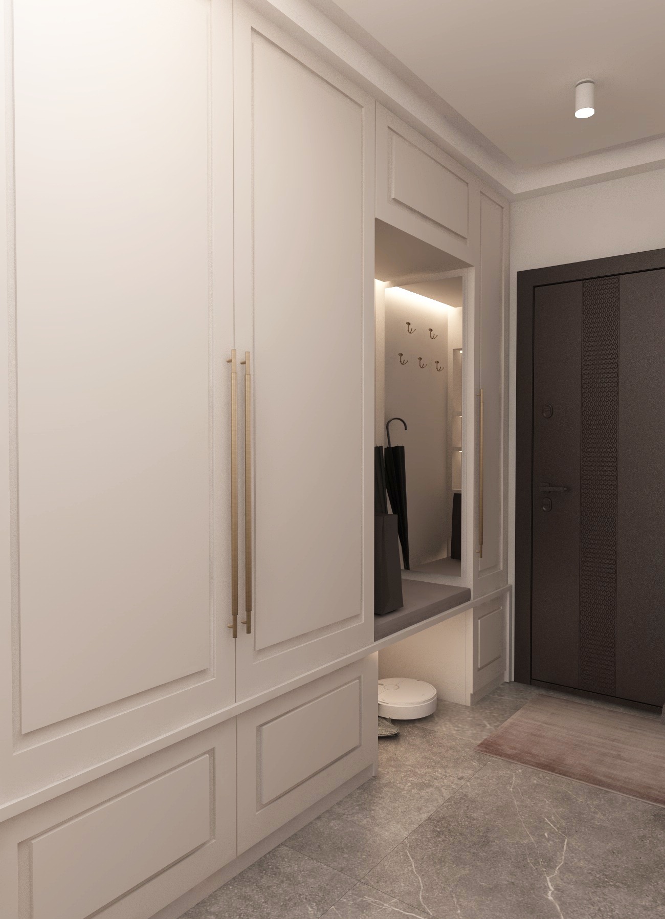 Nowoczesny przedpokój z zabudową meblową w kolorze écru, z wbudowanym siedziskiem i lustrem, parasolem, robotem sprzątającym na podłodze z szarego gresu.