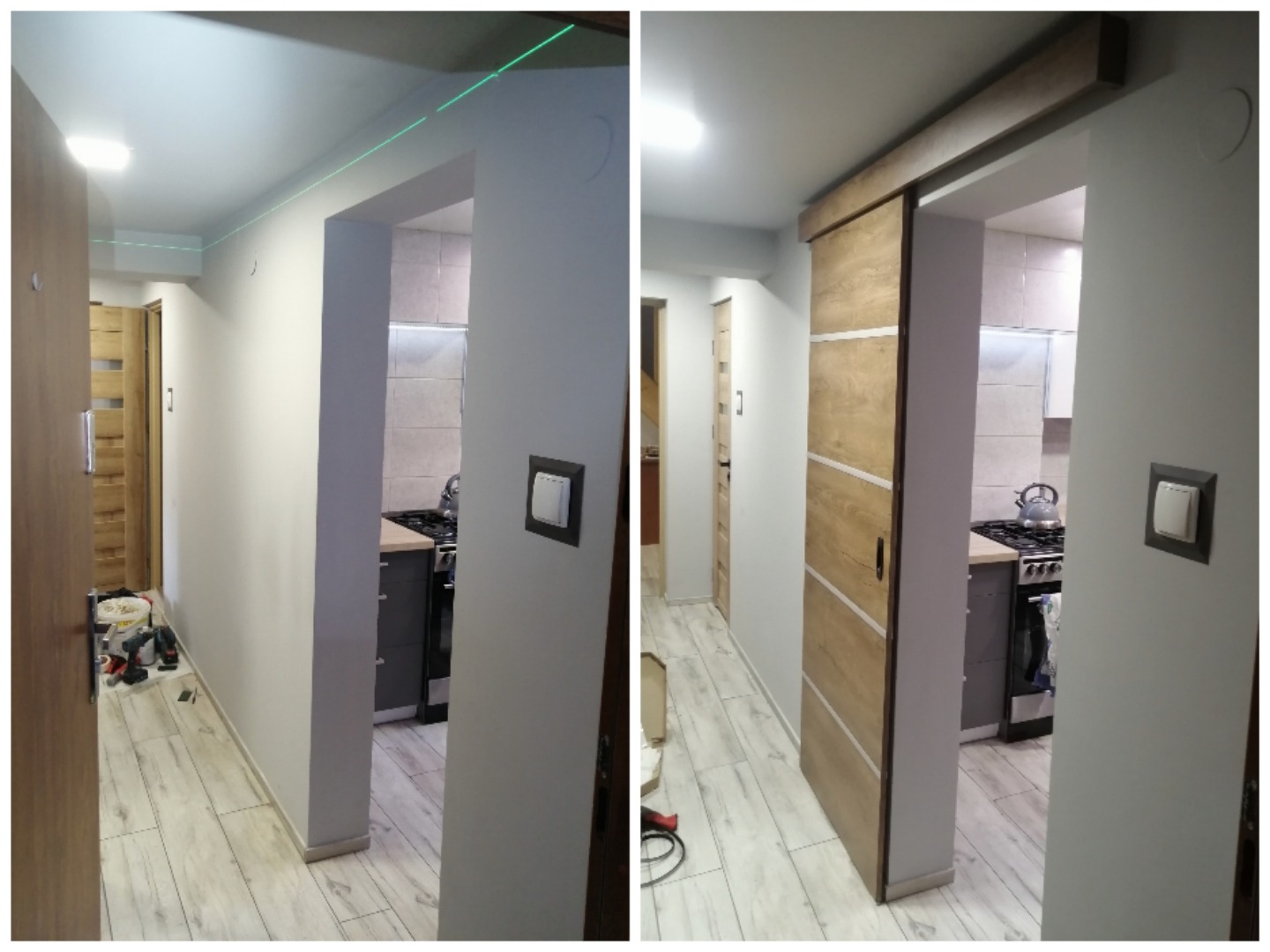 Montaż drewnianych drzwi przesuwnych w korytarzu, widoczny laser poziomujący na ścianie, częściowo wyposażona kuchnia w tle.
