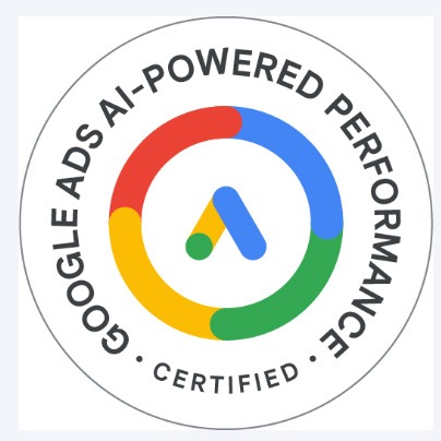 Okrągła odznaka Google Ads AI-Powered Performance Certified z logo Google Ads wewnątrz, otoczona kolorowym pierścieniem (czerwony, żółty, zielony, niebieski).