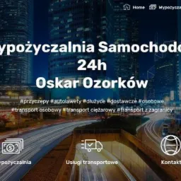 Strona internetowa wypożyczalni samochodów Oskar Ozorków z nocnym widokiem miasta w tle i hashtagami: przyczepy, autolawety, dłużyce, dostawcze, osobowe, transport osobowy, ciężarowy, z zagranicy.