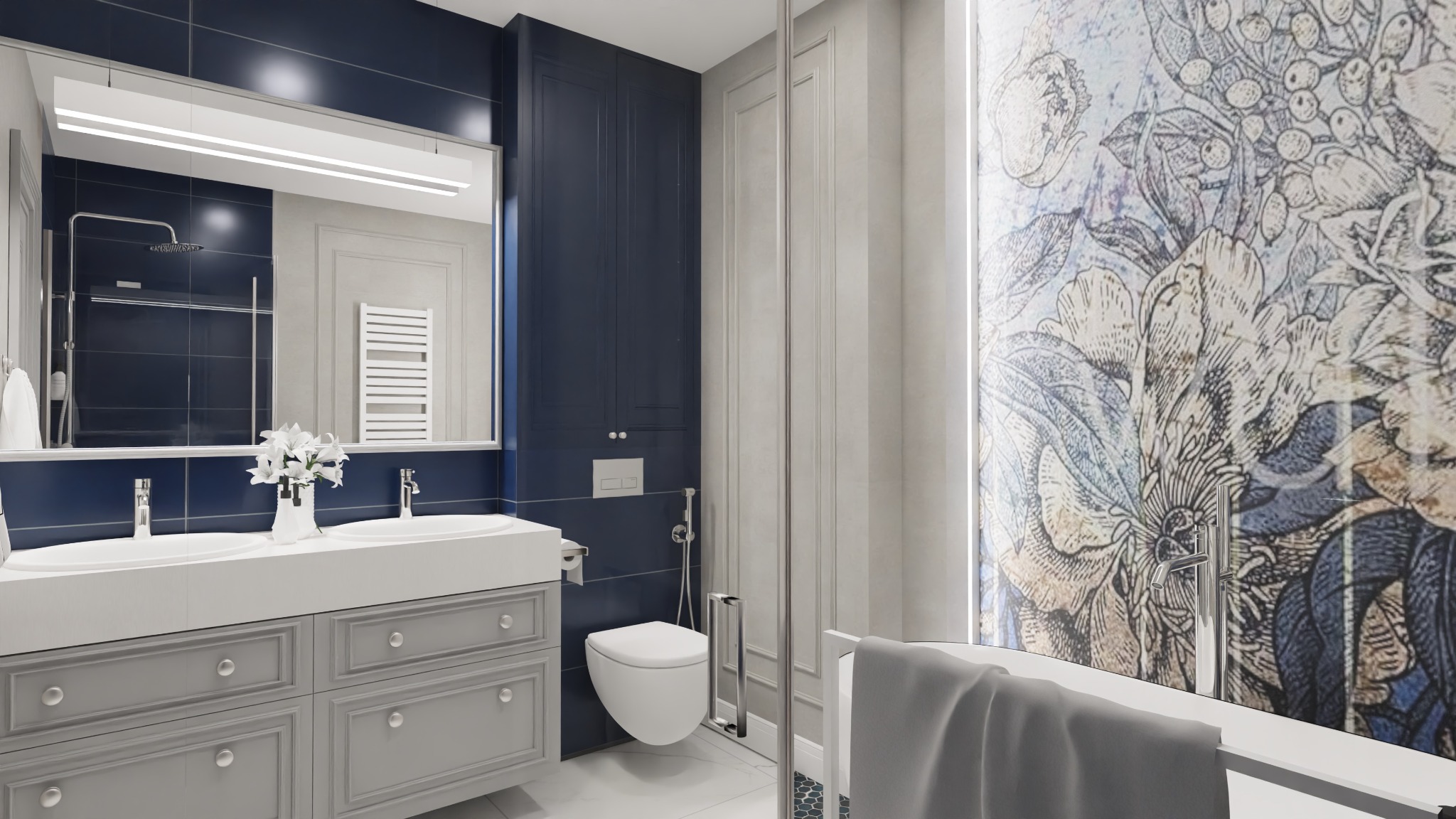 Elegancka łazienka z podwójną umywalką na szarej szafce, granatowymi płytkami i szafką, toaletą w rogu oraz wanną z motywem kwiatowym na ścianie.