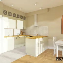 Wizualizacja jasnej kuchni z drewnianym blatem, białymi szafkami z czarnymi uchwytami i dekoracyjną lampą wiszącą z plecionki nad białym stołem z krzesłami.