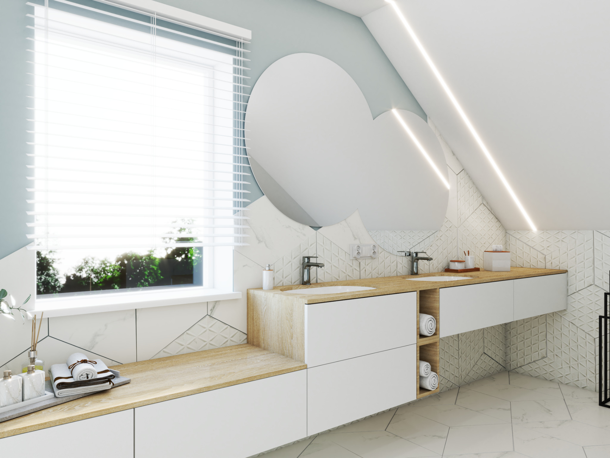 Jasna łazienka na poddaszu z dwoma umywalkami, dużym okrągłym lustrem i geometrycznymi płytkami na ścianach.