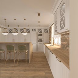 IMO studio - Wnętrze kuchni w stylu klasycznym z wyspą, białymi szafkami, drewnianym blatem i podłogą. Widoczne trzy krzesła barowe z zielonymi siedziskami i trzy wiszące lampy.