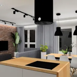 Wizualizacja nowoczesnej kuchni z wyspą, ceglaną ścianą, czarnymi lampami wiszącymi i szynoprzewodami oświetleniowymi. Minimalistyczne krzesła przy drewnianym stole. Rośliny doniczkowe dodają...