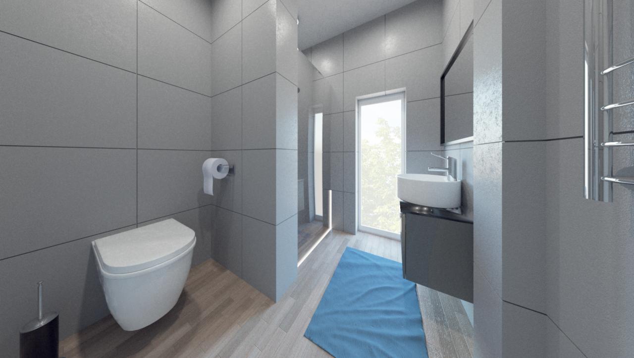 Nowoczesna łazienka z szarymi płytkami, podwieszaną toaletą i umywalką, podkreślona błękitnym dywanikiem i naturalnym światłem wpadającym przez okno.