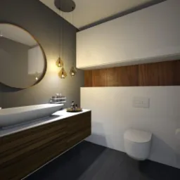 Nowoczesna łazienka z owalnym lustrem w miedzianej ramie, wiszącą umywalką na szafce z drewnianymi frontami, podwieszaną toaletą i dekoracyjnymi lampami wiszącymi.