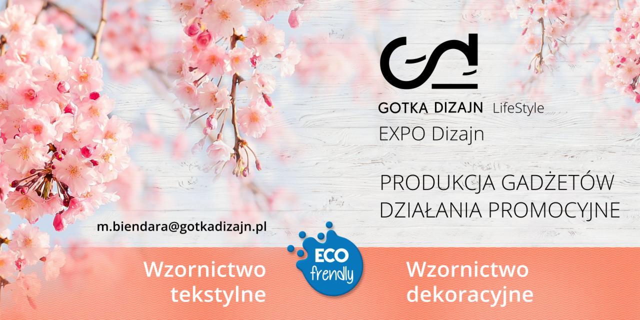 Grafika reklamowa firmy Gotka Dizajn z logo, adresem e-mail i hasłami: Produkcja gadżetów, Działania promocyjne, Wzornictwo tekstylne i dekoracyjne, na tle z kwitnącymi gałązkami wiśni.