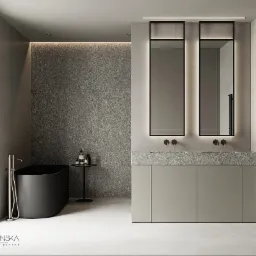 Nowoczesna łazienka w odcieniach szarości z czarną wanną wolnostojącą, minimalistyczną armaturą i podświetlanymi lustrami.