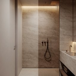 Edyta Sowińska Interior Design - Minimalistyczna łazienka z kabiną typu walk-in, wykończona płytami imitującymi marmur w ciepłych odcieniach beżu. Armatura w kolorze miedzi, podświetlenie LED.