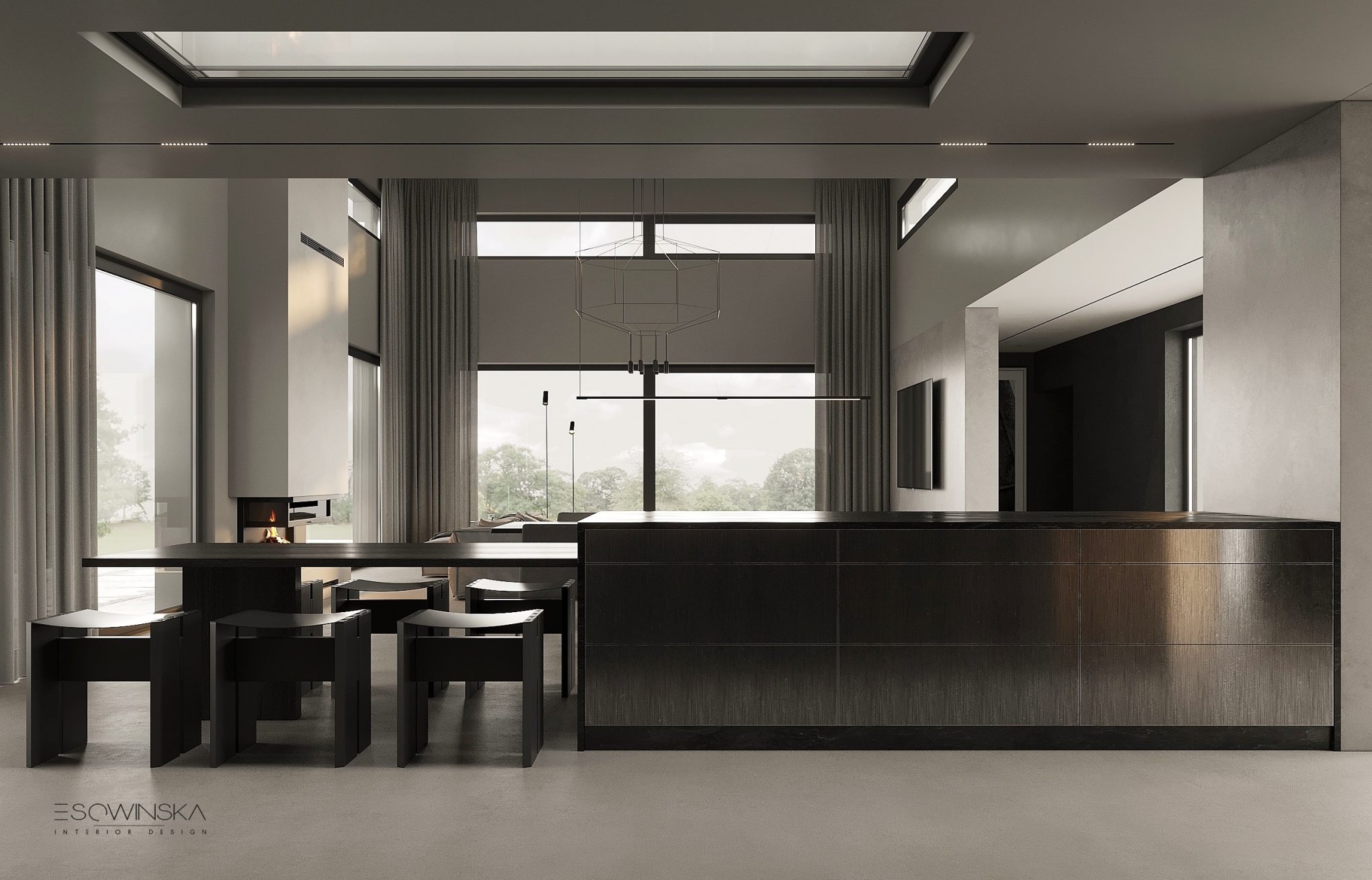 Minimalistyczna kuchnia z wyspą i stołem jadalnym w przestronnym wnętrzu z dużymi oknami i kominkiem, oświetlona naturalnym światłem