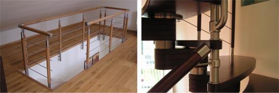 Barierka schodowa z drewnianymi elementami i metalowymi linkami zabezpieczającymi, widok z góry na otwór w podłodze z drewnianą podłogą, obok fragment krętych schodów z ciemnego drewna i metalu.